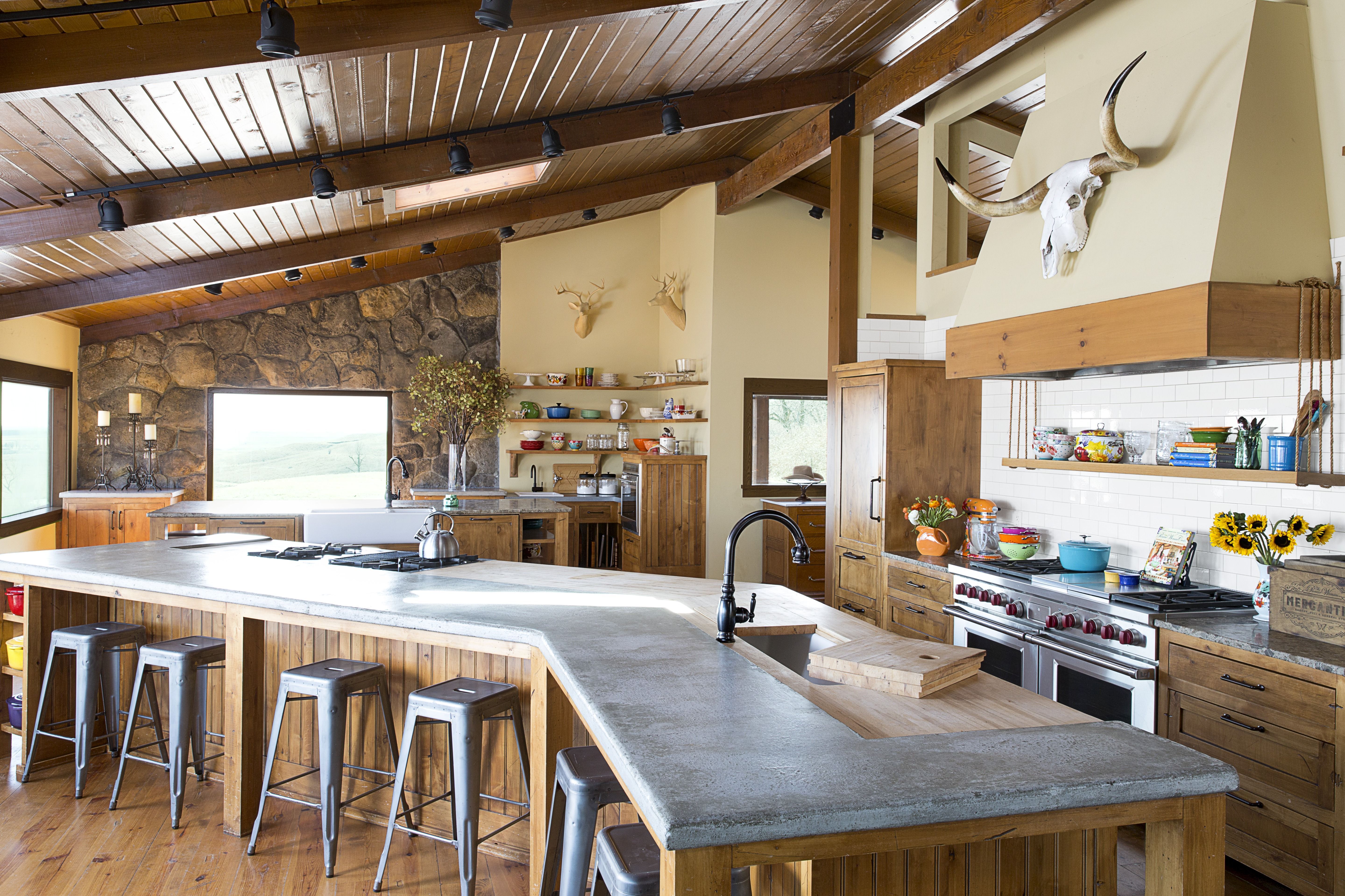 kitchen island with stove and seating