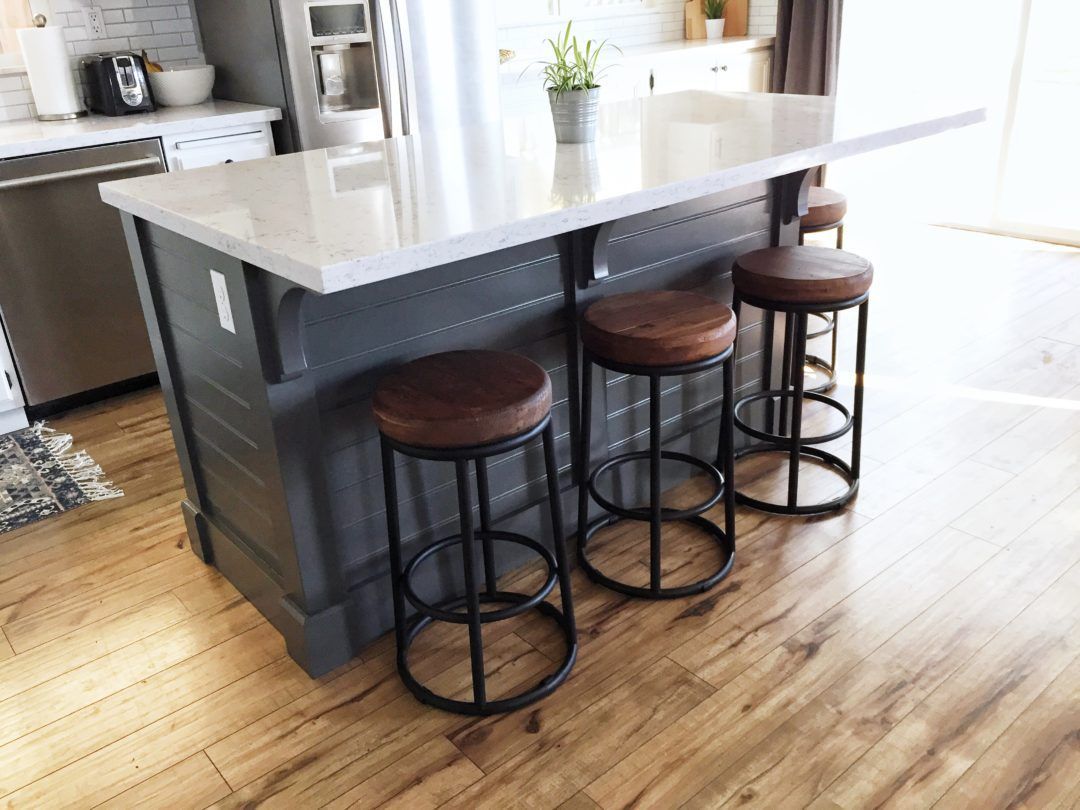 small kitchen island with 4 stools