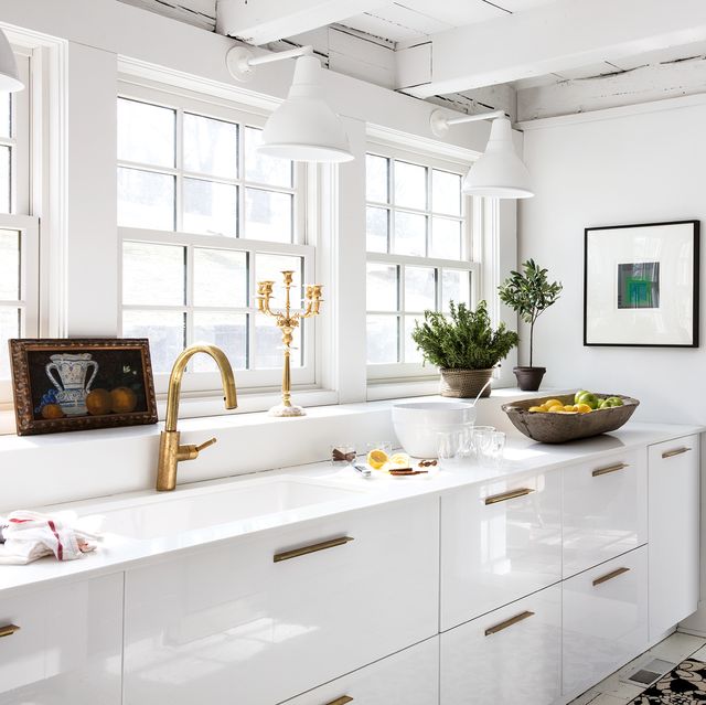 white kitchen with wall art and decor
