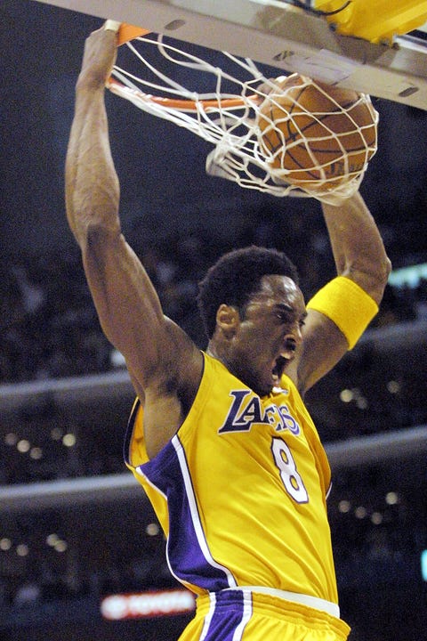 Kobe Bryant of the Los Angeles Lakers dunks the ba