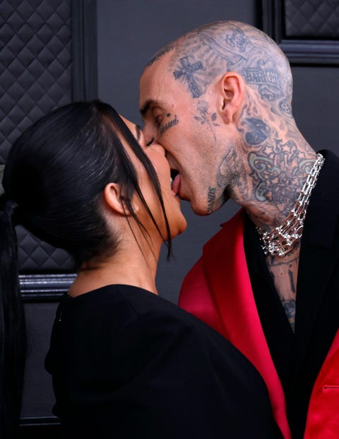 Kourtney Kardashian and Travis Barker kissing at the Grammys kourtney kardashian and travis barker kissing at the grammys