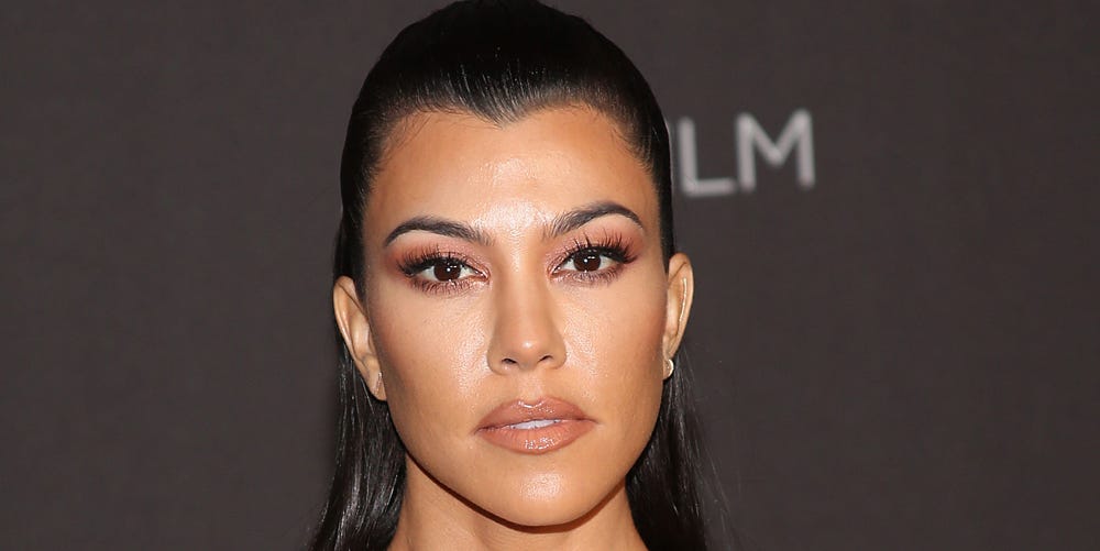 Kourtney Kardashian goes makeup free in poolside bikini pic