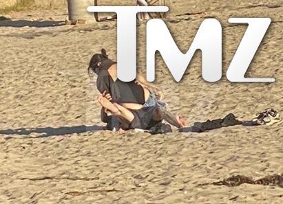 Kourtney Kardashian and Travis Barker making out on the beach kourtney kardashian and travis barker making out on the beach