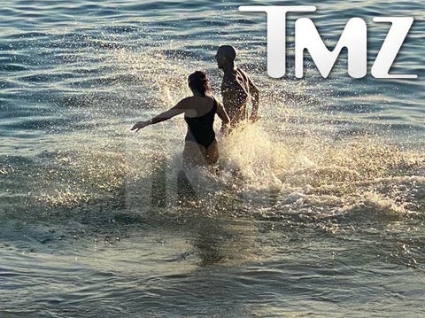 Kourtney Kardashian and Travis Barker making out on the beach kourtney kardashian and travis barker making out on the beach