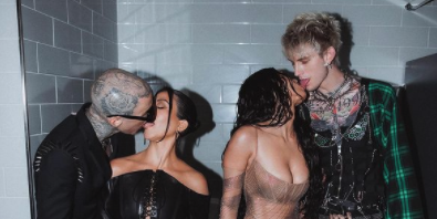 Kourtney just posted a group kissing video with Travis, Megan and MGK and people are losing it