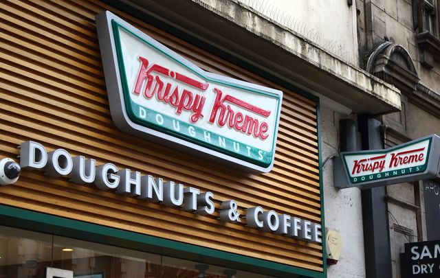 krispy kreme store and brand logo seen in london, uk