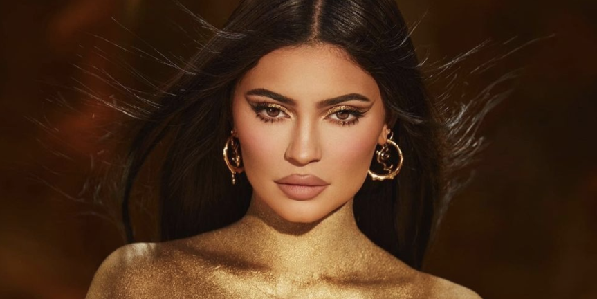 Kylie Jenner is Naked, Painted Gold, And Wearing Nothing But A Thong