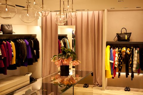 Boutique, Room, Interior design, Outlet store, Building, Retail, Clothes hanger, Closet, Furniture, Fashion accessory, 