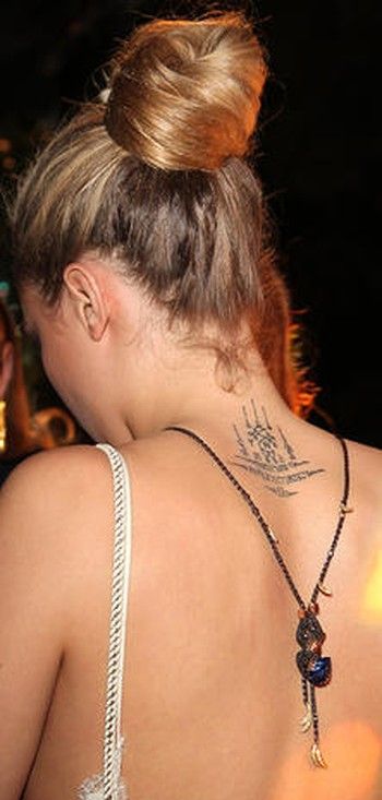 Ear, Hairstyle, Shoulder, Joint, Style, Back, Amber, Tattoo, Fashion, Neck, 