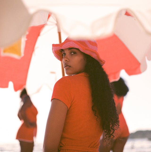 woman wearing a bucket hat