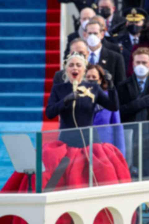 lady-gaga-sings-the-national-anthem-at-the-inauguration-of-news-photo-1611163213.