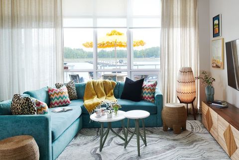 Living room, Room, Furniture, Interior design, Blue, Curtain, Property, Yellow, Turquoise, Coffee table, 