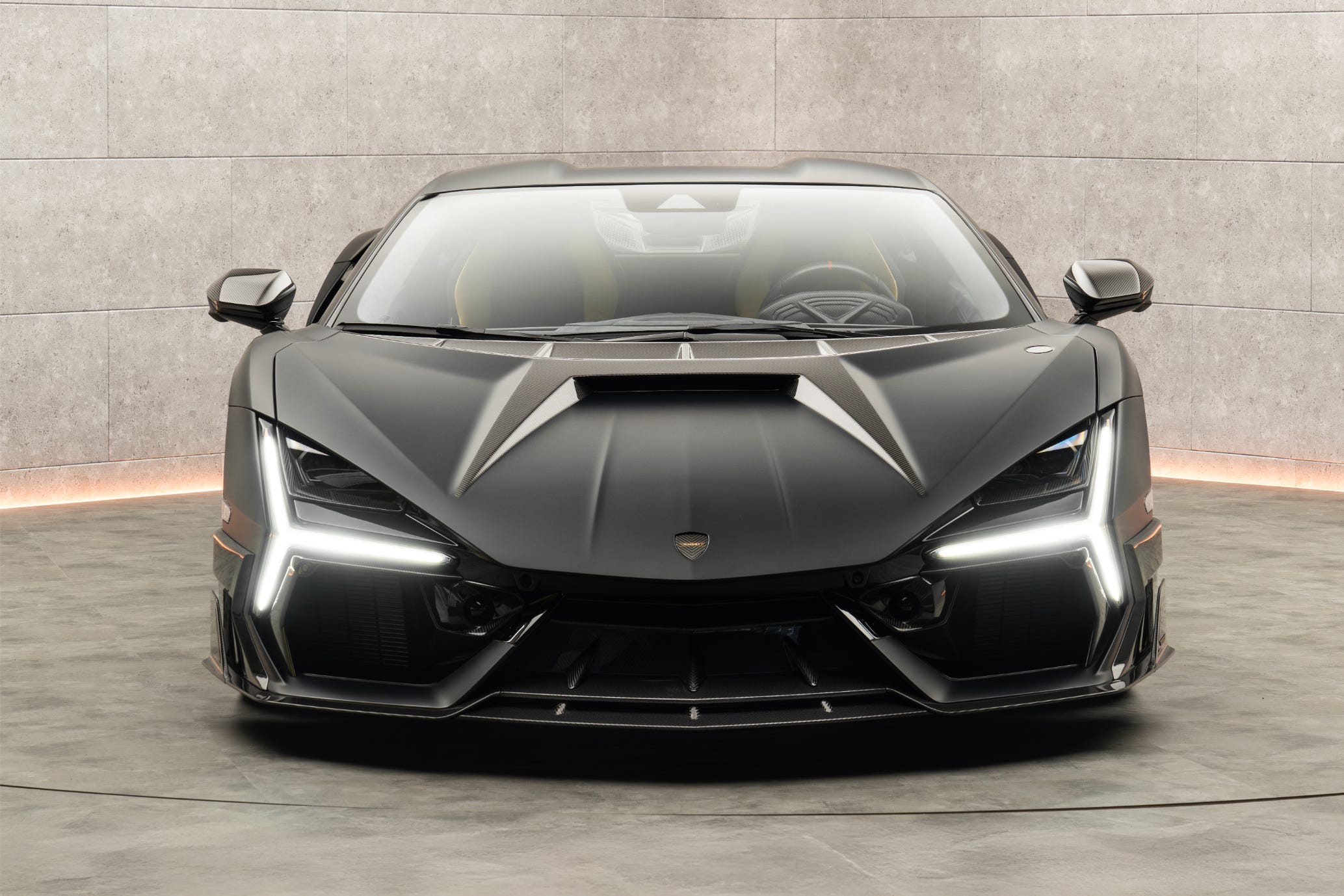 Mansory's Latest Monster Is This Blacked-Out Lamborghini Revuelto