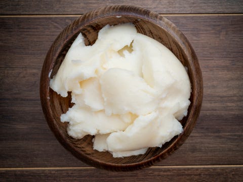 lard in a bowl on dark rustic background