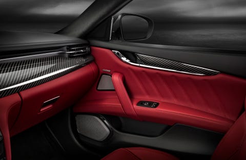 Vehicle, Car, Vehicle door, Red, Automotive design, Luxury vehicle, Center console, Steering wheel, Personal luxury car, Automotive exterior, 