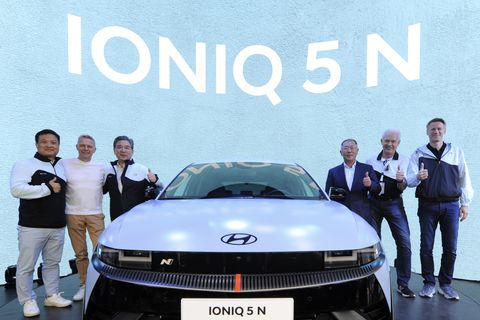 ioniq 5 n with older guys giving thumbs up in the background