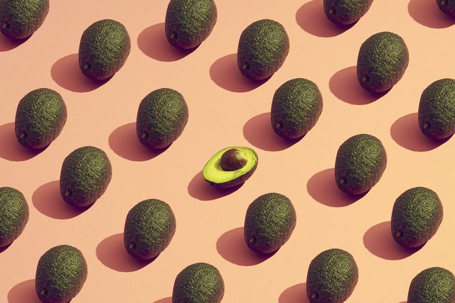 large group of avocados placed in a pattern