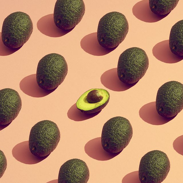 large group of avocados placed in a pattern