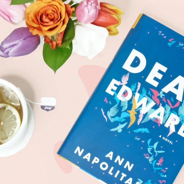dear edward novel with bouquet of flowers and cup of tea