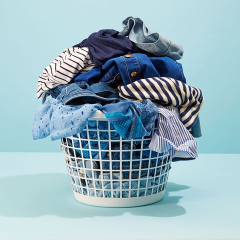 laundry basket full of dirty clothing