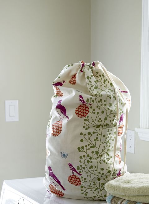 Laundry room with textile laundry bag