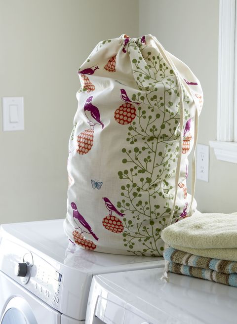 Laundry room with textile laundry bag