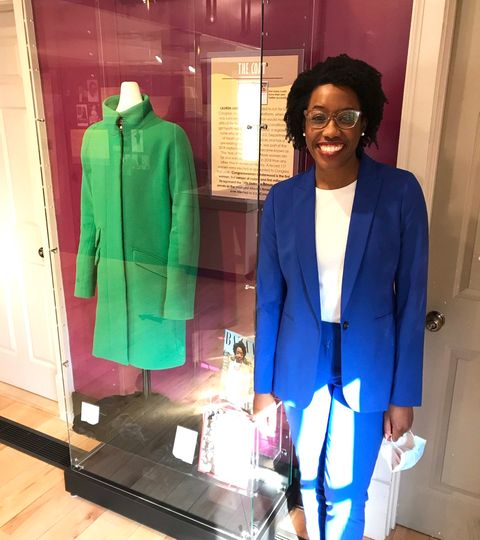 underwood visits her iconic green coat purchased on sale from j crew at naper settlement's women waves of change exhibit