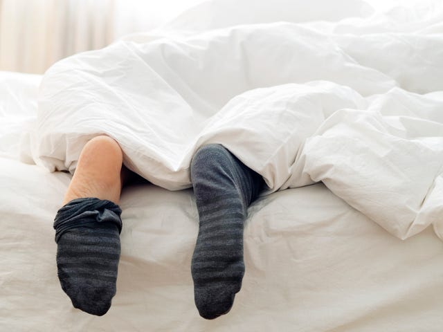 Wearing Socks in Bed Could Help You Sleep Better, Says NHS Doctor