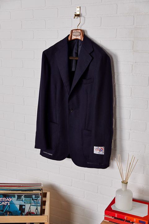 Clothing, Outerwear, Suit, Formal wear, Blazer, Jacket, Clothes hanger, Tuxedo, Sleeve, Top, 