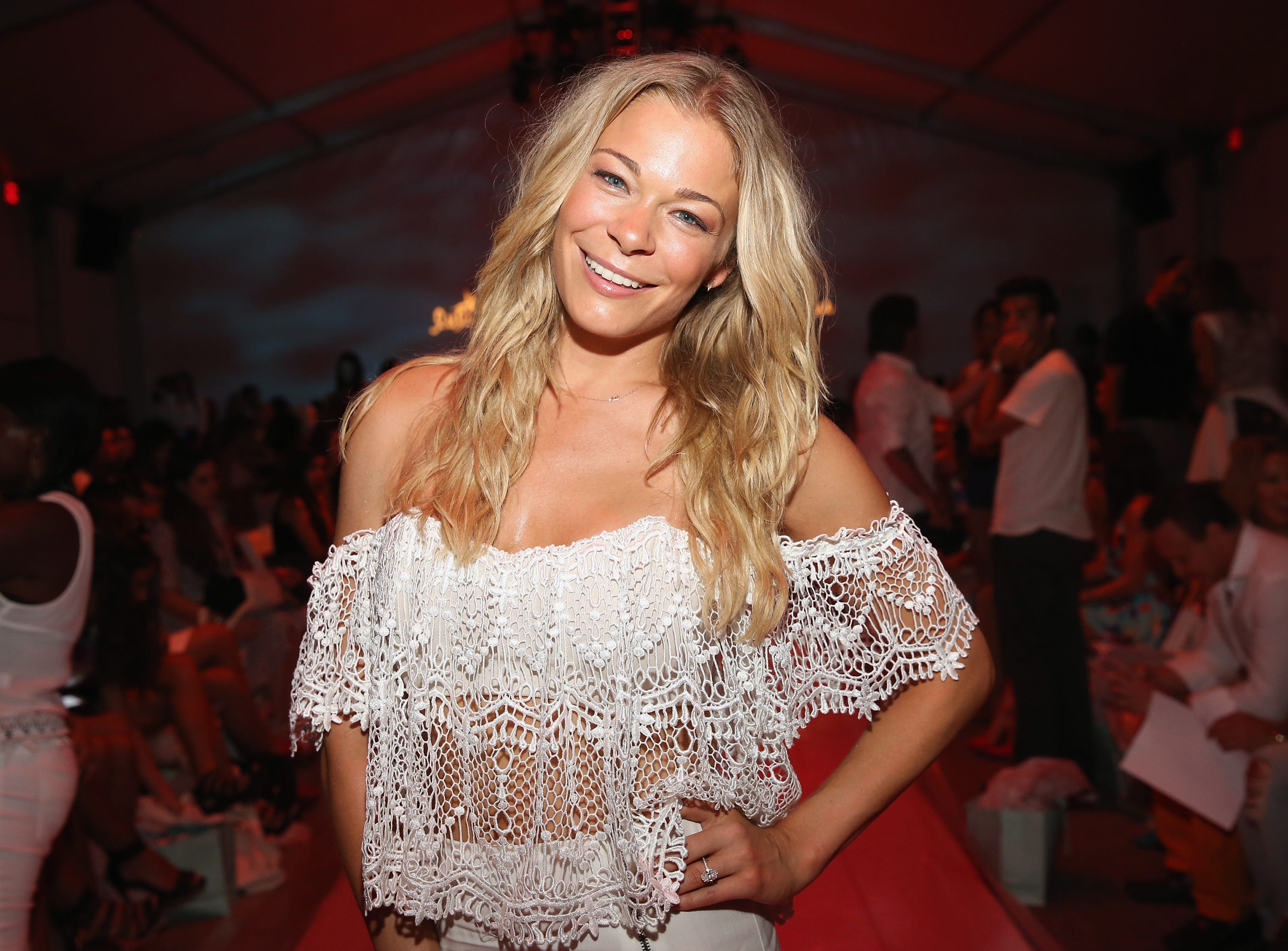 LeAnn Rimes Stuns in a Low-Cut Maxi Dress as She Frolicks on the Beach