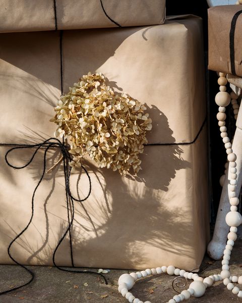brown paper packages with dried hydrangea