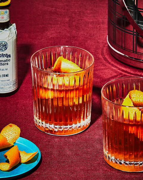 old fashioned cocktail with rye or bourbon, angostura bitters and sugar cube