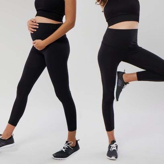 two models wear black maternity workout clothes in a roundup of maternity activewear 2022
