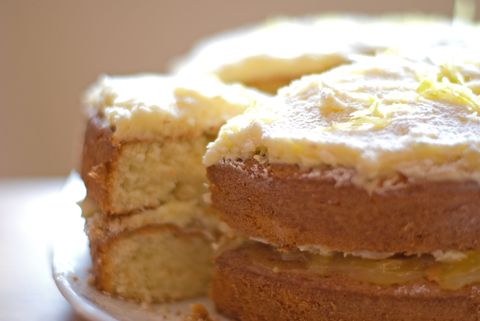 Lemon cake, with the first slice cut