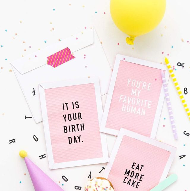 three letterboard style diy birthday cards in pink on table strewn with confetti