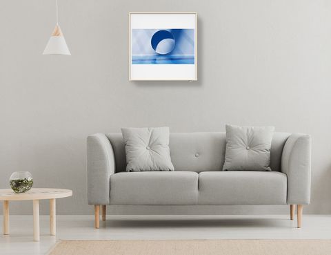 lg air conditioner as framed artwork above a couch