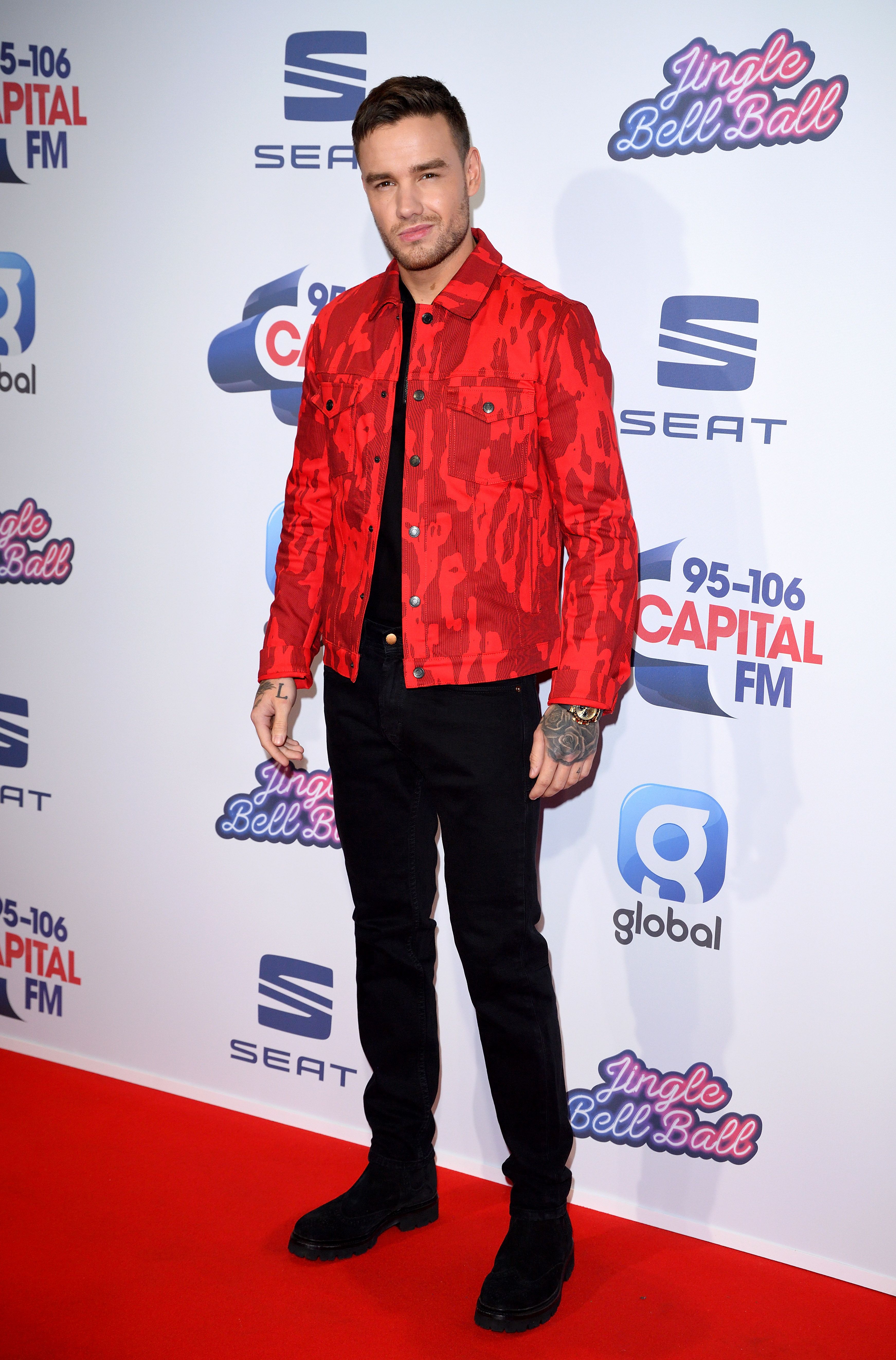 Liam Payne looks unrecognisable with blonde hair and eyebrow slit
