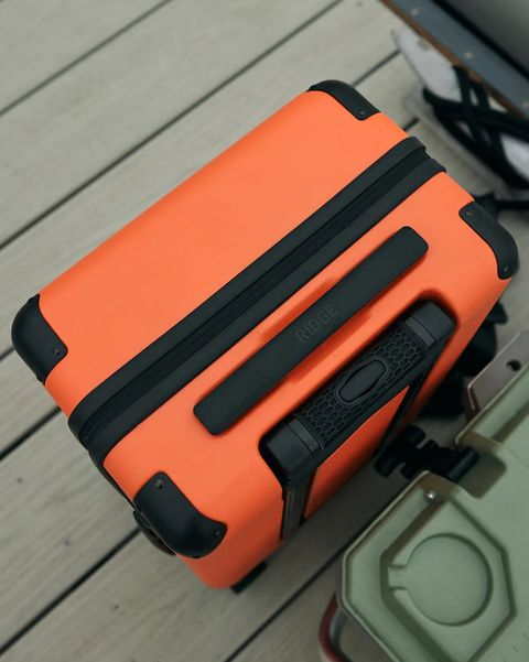 a orange ridge carry on suitcase