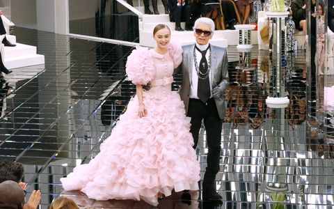 paris, france   january 24  model lily rose depp and stylist karl lagerfeld acknowledge the applause of the audience,  in front of  lily roses mother vanessa paradis, at the end of the chanel  spring summer 2017 show as part of paris fashion week on january 24, 2017 in paris, france  photo by bertrand rindoff petroffgetty images