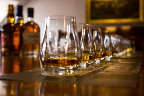 A line of whiskey tasting glasses