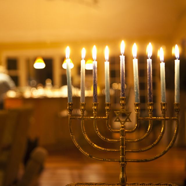 lit menorah in home