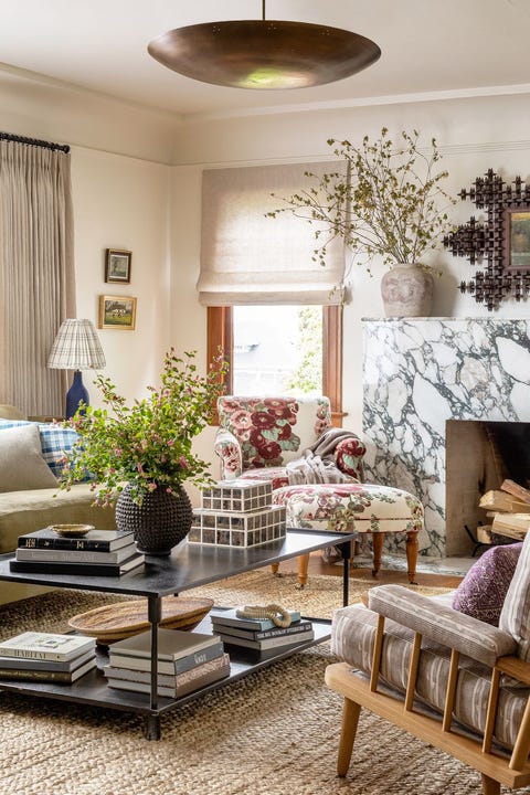 eclectic living room with marble fireplace