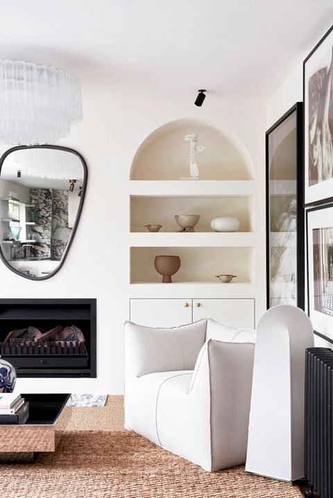 modern minimalist living room with avant garde mirror