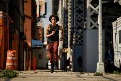 man jogging wearing lululemon surge joggers