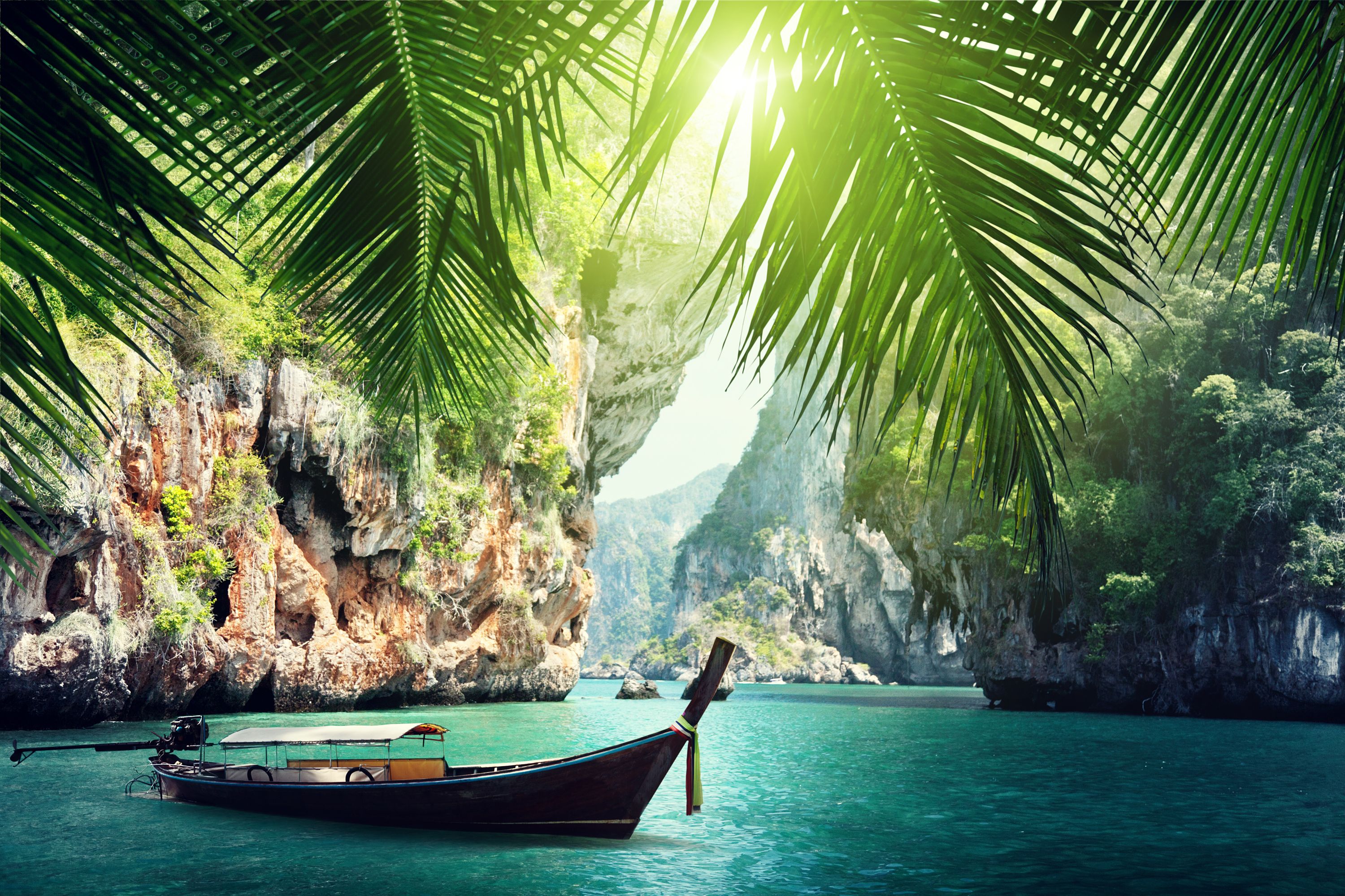 14 Most Beautiful Countries In The World 2022   Long Boat Docked On Beach In Krabi Thailand Summers Royalty Free Image 1622044679 