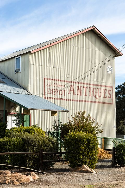 yellow exterior of los alamos antiques depot in los alamos california