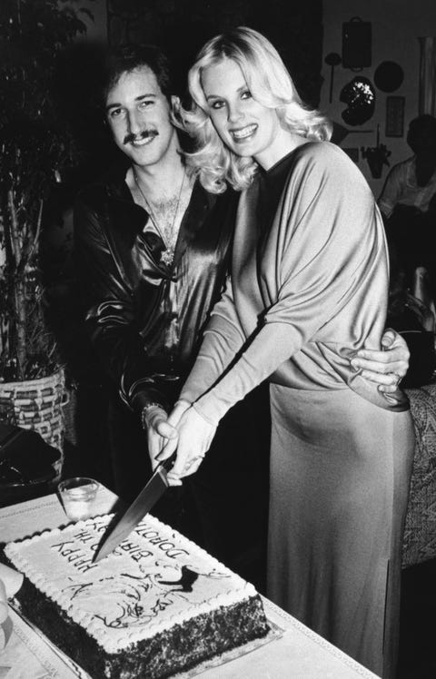 Model Dorothy Stratten and Husband Cut Birthday Cake model dorothy stratten and husband cut birthday cake