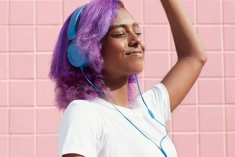 spotify girl listening to music with headphones