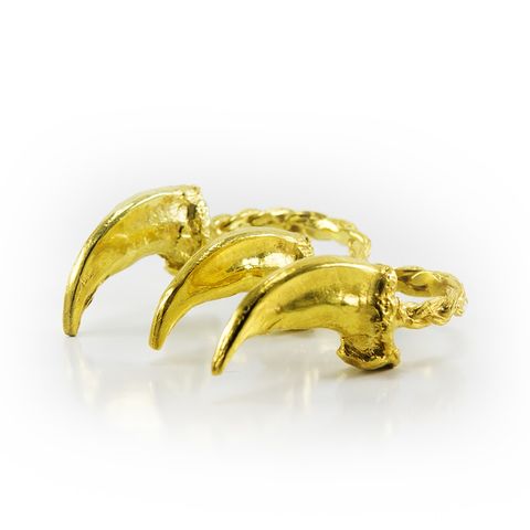 a two finger ring featuring 24k gold plated wolf claws by louise solomon ﻿