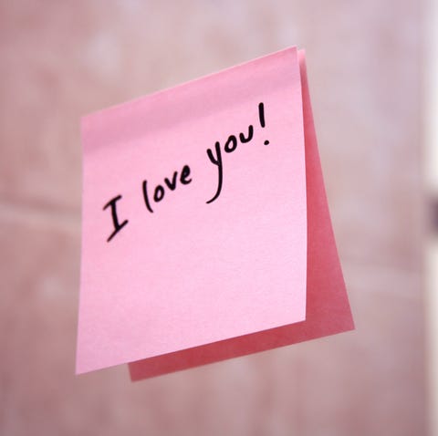 I love you pink post it note stuck to the wall